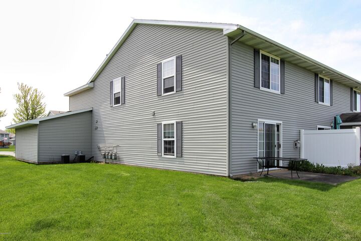 Property Photo:  5428 Rivertown Circle SW  MI 49418 