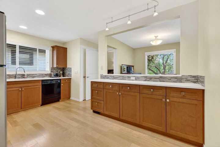 Property Photo:  10540 Oakfield Drive SW  AB T2W 2A9 