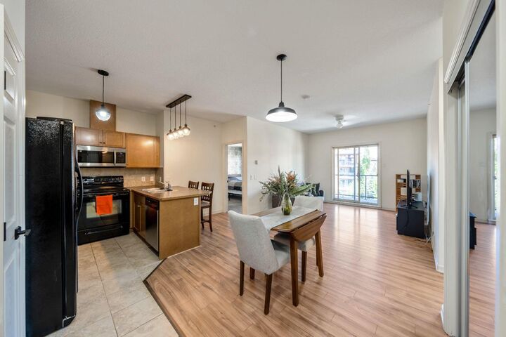 Property Photo:  92 Crystal Shores Road 1402  AB T1S 2M8 