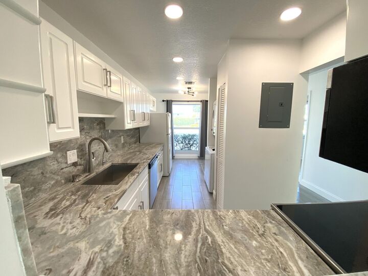 Property Photo:  2450 Black Olive Boulevard A  FL 33445 