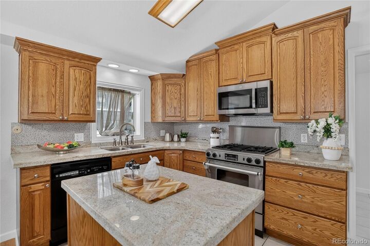 Property Photo:  4749 S Xenophon Street  CO 80465 