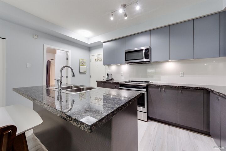 Property Photo:  6440 194 Street 215  BC V4N 6J7 