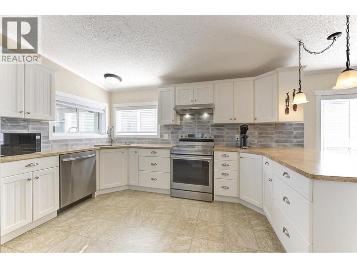 Property Photo: 2440 Old Okanagan Highway 1304 BC V4T 3A2