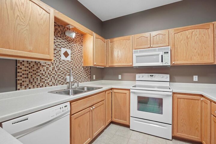Property Photo:  103 Star Street E 6  MN 55358 