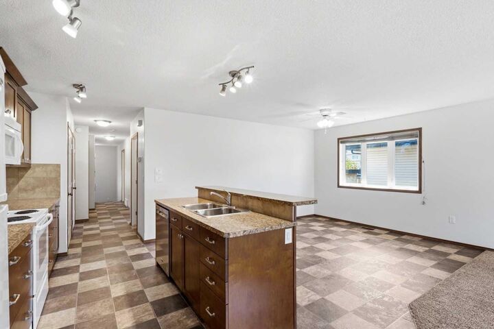 Property Photo:  4425 55 Avenue  AB T4H 1B9 