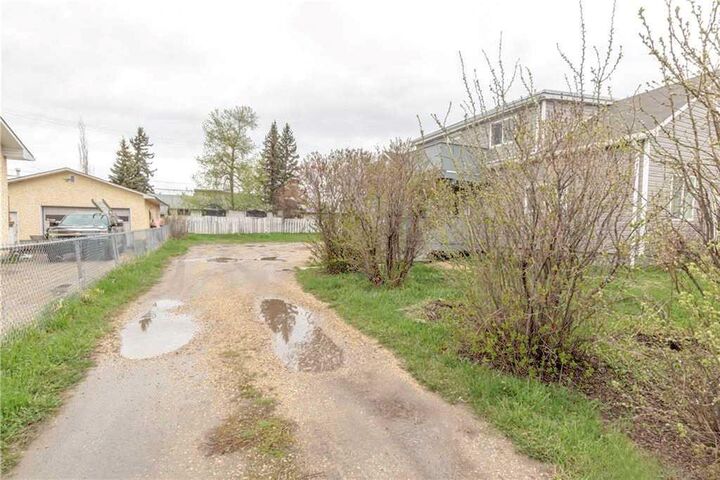 Property Photo:  10112 104 Avenue SW  AB T8V 1E7 