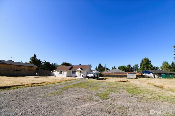 Property Photo:  1219 &1229 E 72nd  WA 98404 