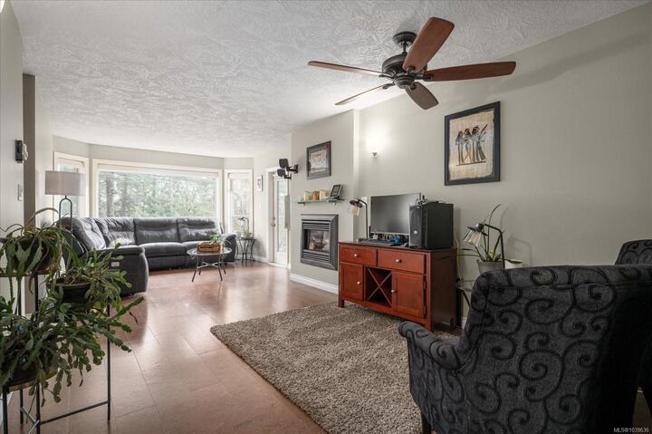 Property Photo: 2 Doric Ave #202 BC V9R 3N1
