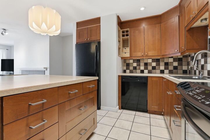 Property Photo: 1111 13 Avenue SW 306 AB T2R 0L7