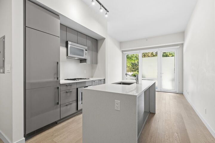 Property Photo: 4488 Cambie Street 104 BC V5Y 0M2