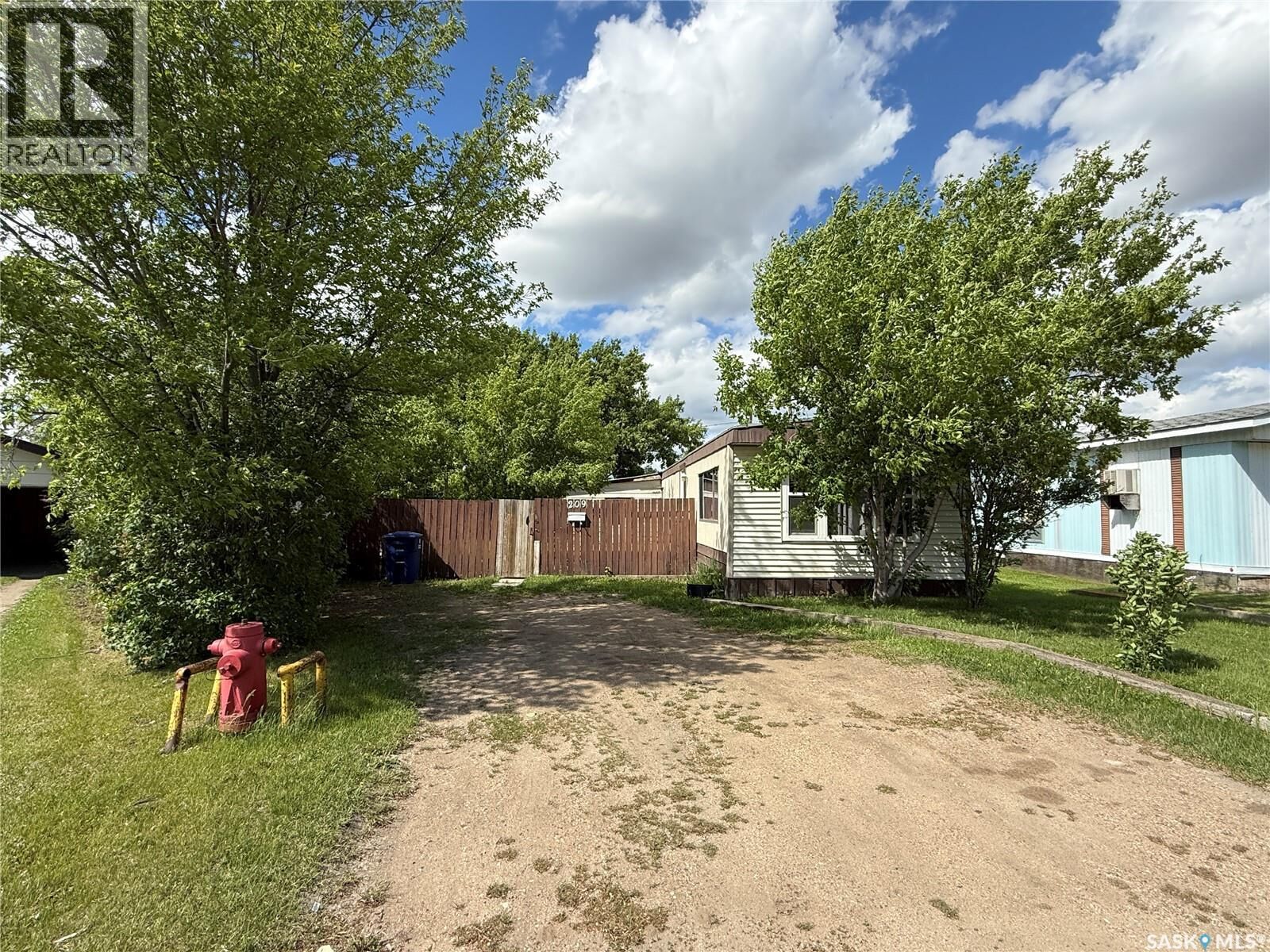 Property Photo:  209 Nelson Place  SK S0K 4S0 