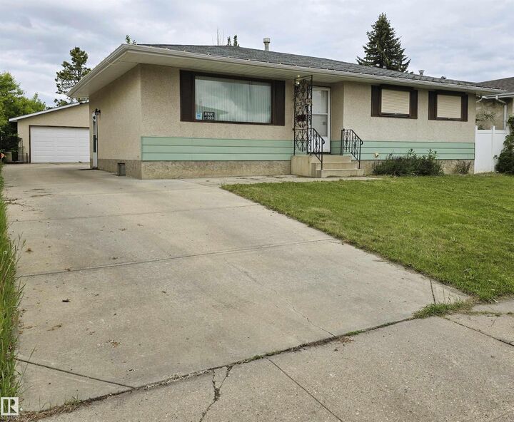 Property Photo:  3718 136A Avenue NW  AB T5A 2P4 
