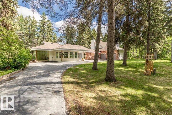 Property Photo: 244013 Twp Road 470 104 AB T9A 1W8