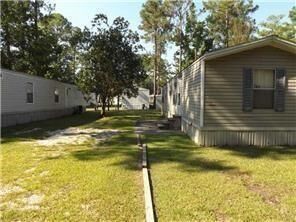 Property Photo: 64096 Mangano Drive 167 LA 70452