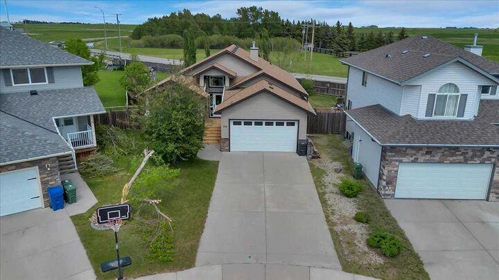 Property Photo: 188 Aspen Creek Crescent AB T1P 0A7