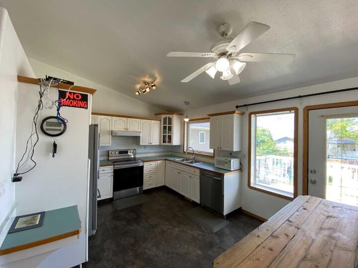 Property Photo: 52 Upland Drive W AB T1R 0P5