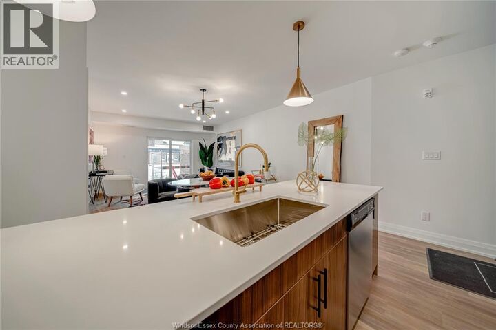 Property Photo:  11957 Tecumseh Road East 308  ON N8R 1L0 