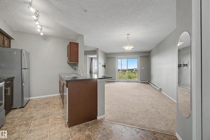 Property Photo:  5370 Chappelle Road SW 313  AB T6W 3L5 