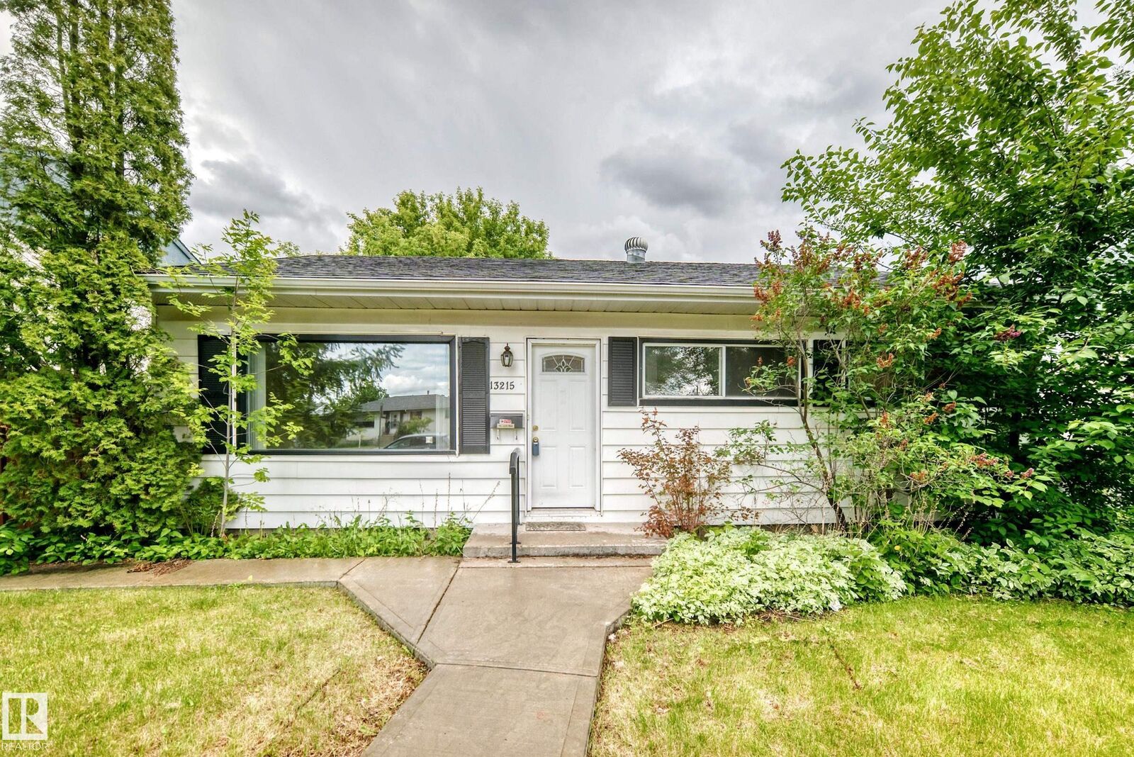 Property Photo:  13215 132 Avenue NW  AB T5L 3R4 