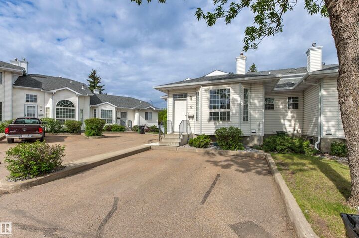Property Photo: 3311 58 Street NW 12 AB T6L 6X3