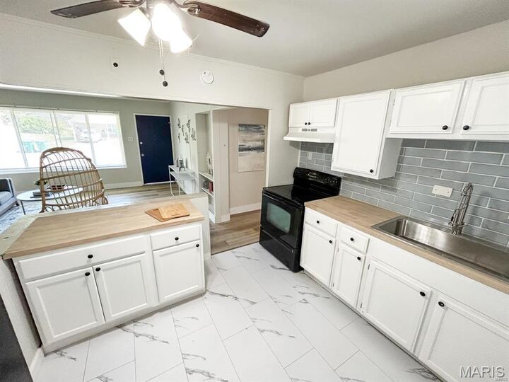 Property Photo:  9839 Lawnview Drive  MO 63136 