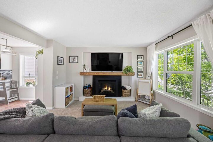 Property Photo:  8 Cimarron Grove Rise  AB T1S 0A6 