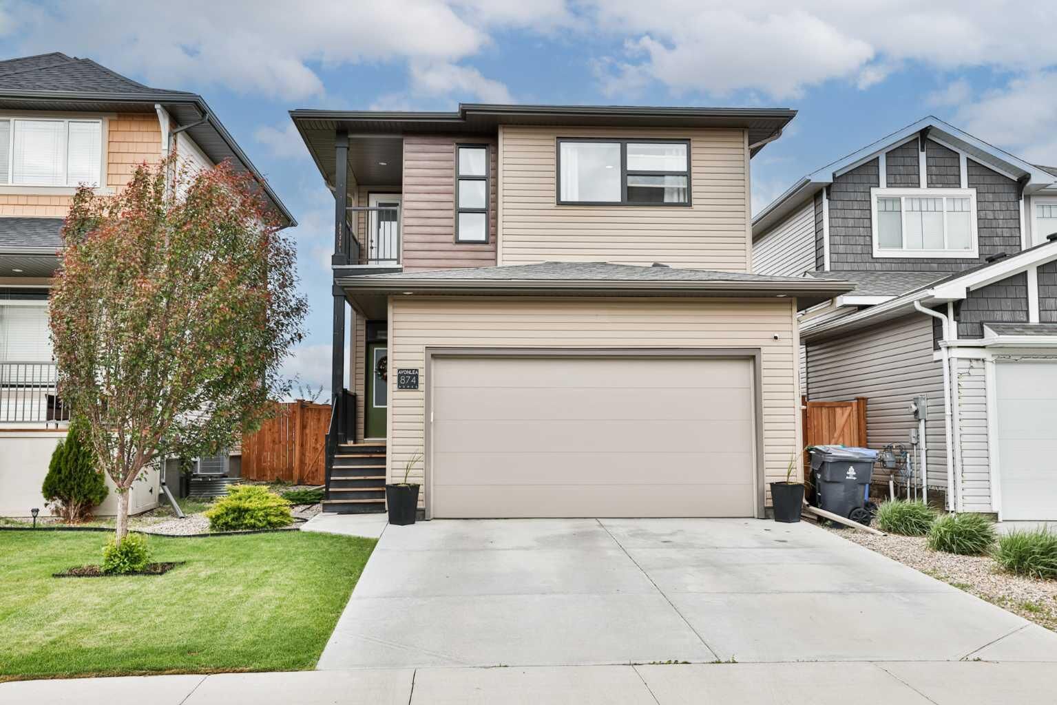 Property Photo:  874 Greywolf Run N  AB T1H 7G6 