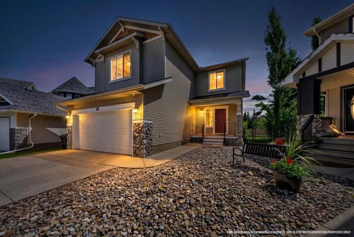 Property Photo: 18 Cougarstone Bay SW AB T3H 4Z4
