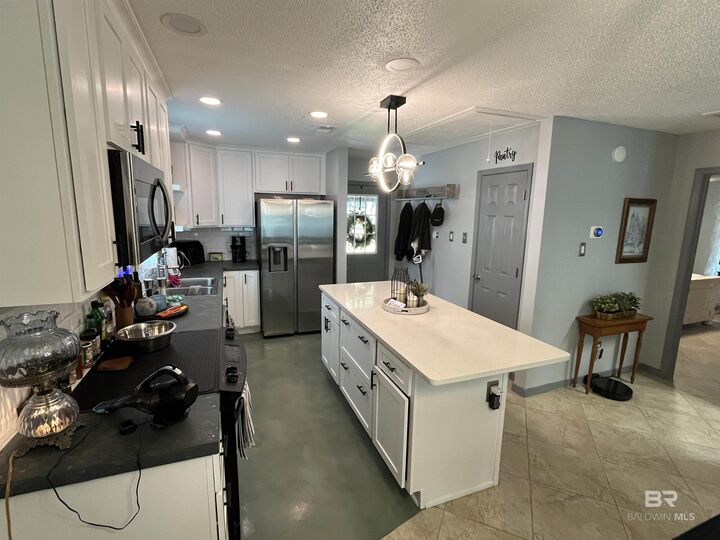 Property Photo:  1033 E 23rd Avenue  AL 36542 