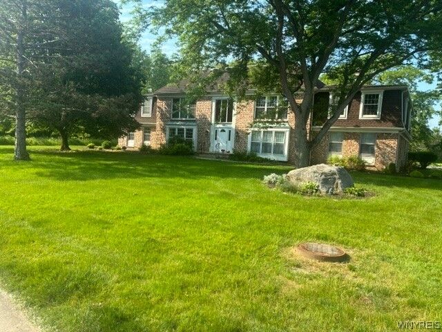 Property Photo:  100 Carriage Dr Drive 7  NY 14127 