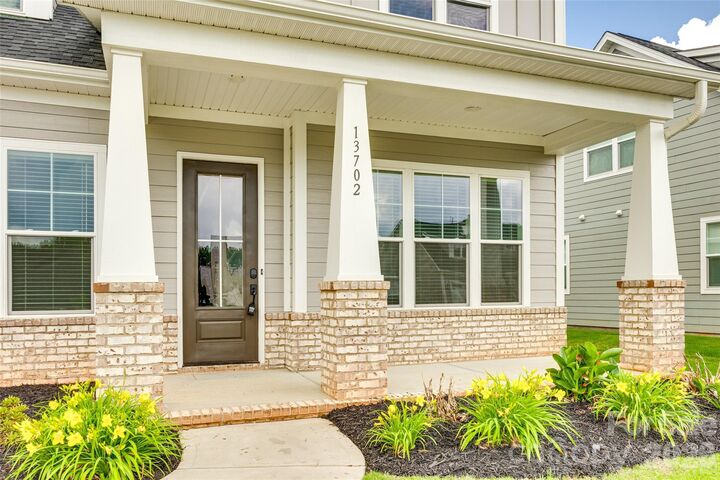 Property Photo:  13702 Tranquil Day Drive  NC 28105 