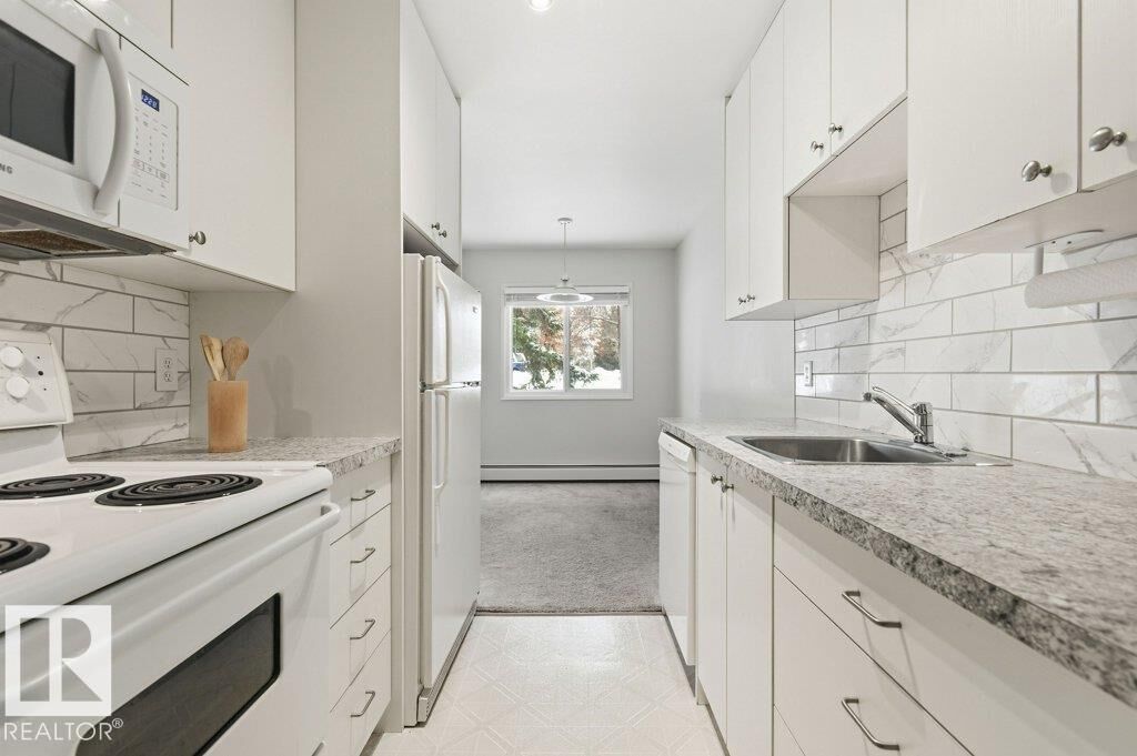 Property Photo: 5730 Riverbend Road NW 124 AB T6H 4T4