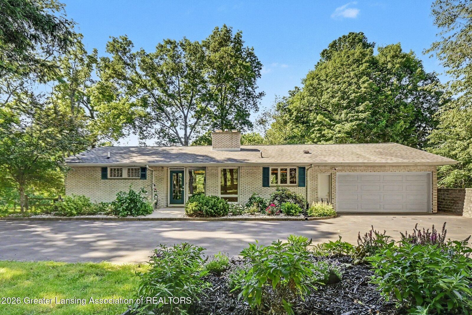 Property Photo:  4811 Delta River Drive  MI 48906 