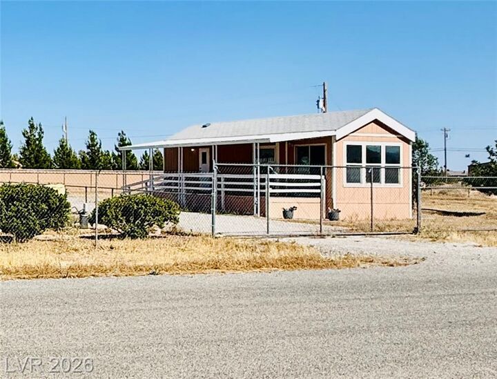 Property Photo:  931 South Warren Street  NV 89048 