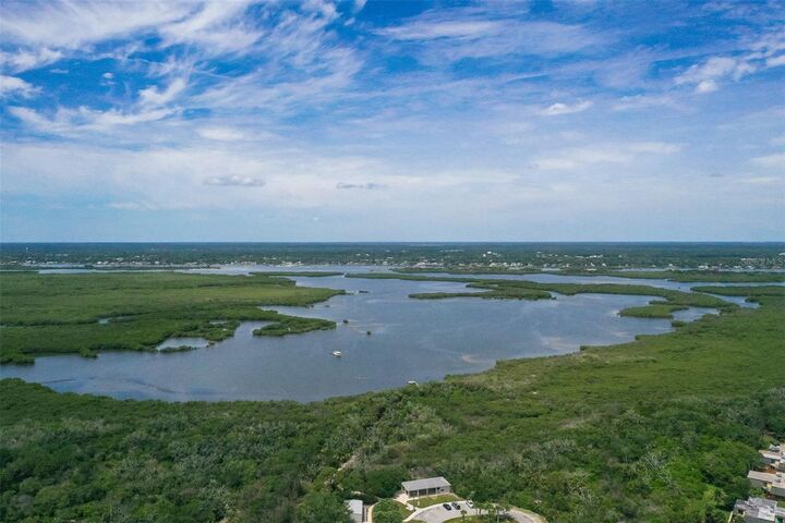 Property Photo:  3800 Saxon Drive A-1  FL 32169 