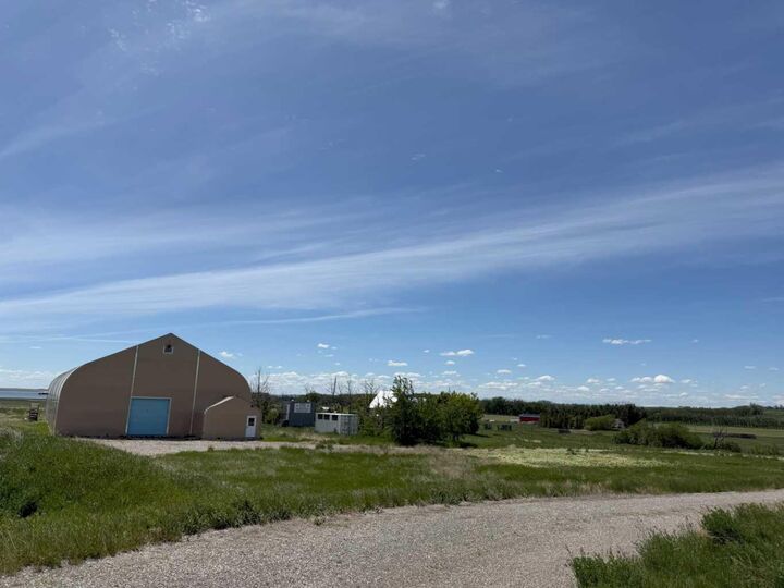 Property Photo: 244029 Highway 1 Highway AB T1P 0J4