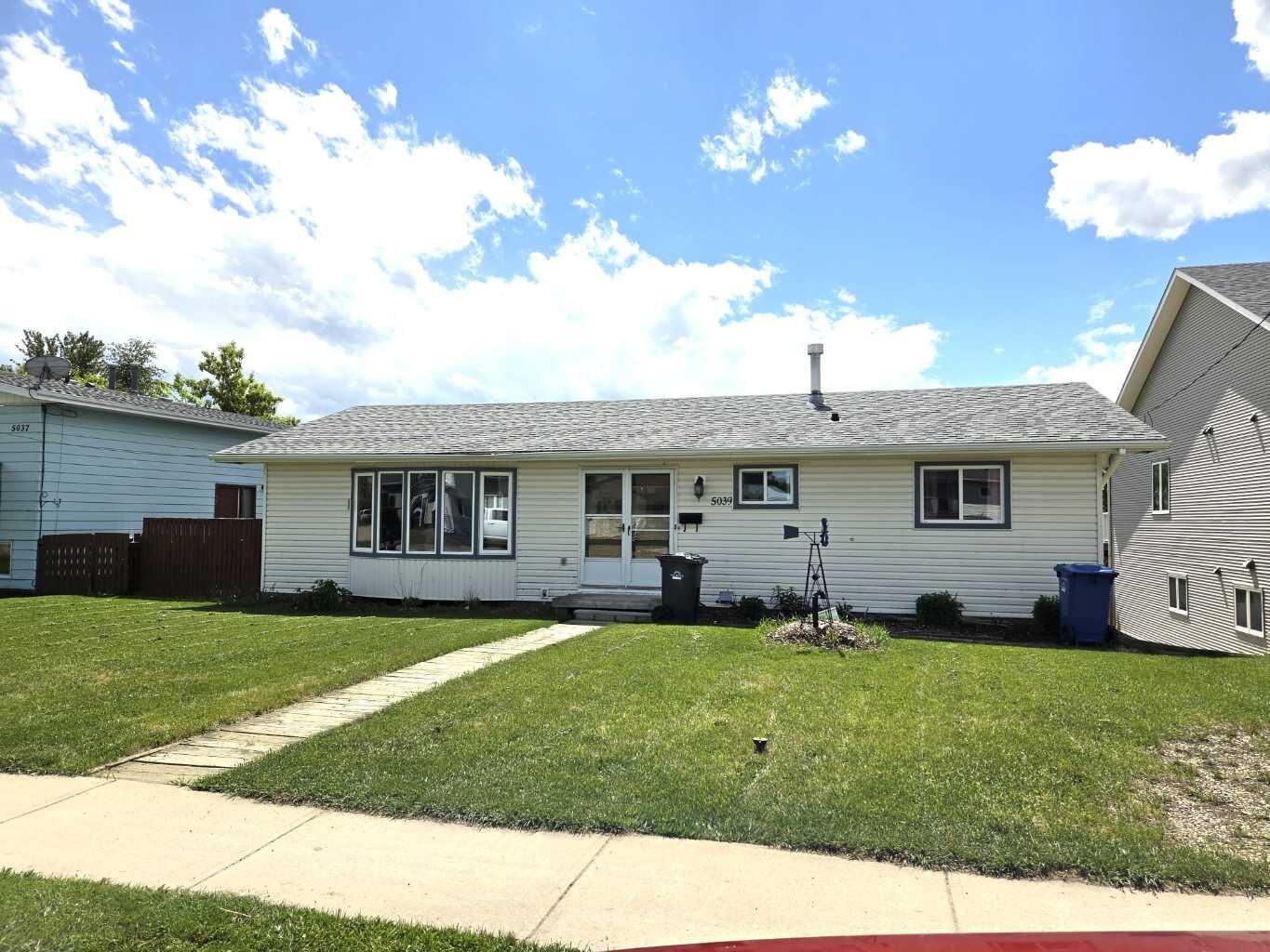 Property Photo: 5039 56 Street E AB T4G 1R3