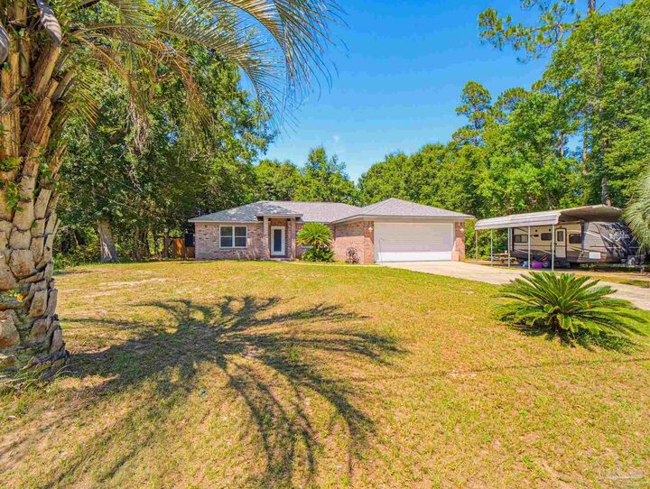 Property Photo:  6668 Delhi Dr  FL 32583 