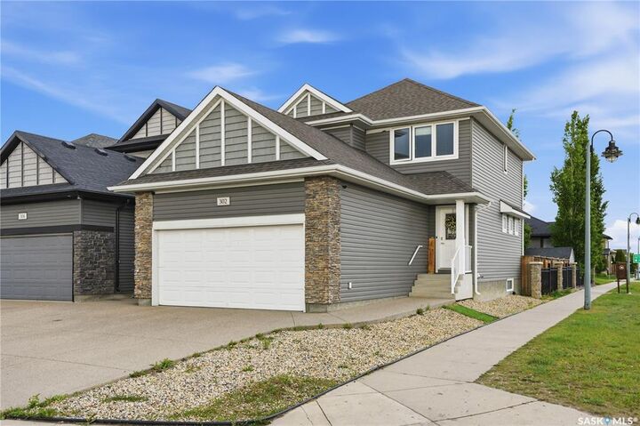 Property Photo: 302 Dickson Crescent SK S7T 0T8