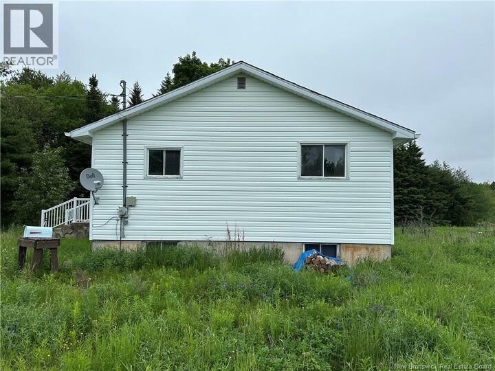 Property Photo:  709 Saint-Charles  NB E4W 4Z6 