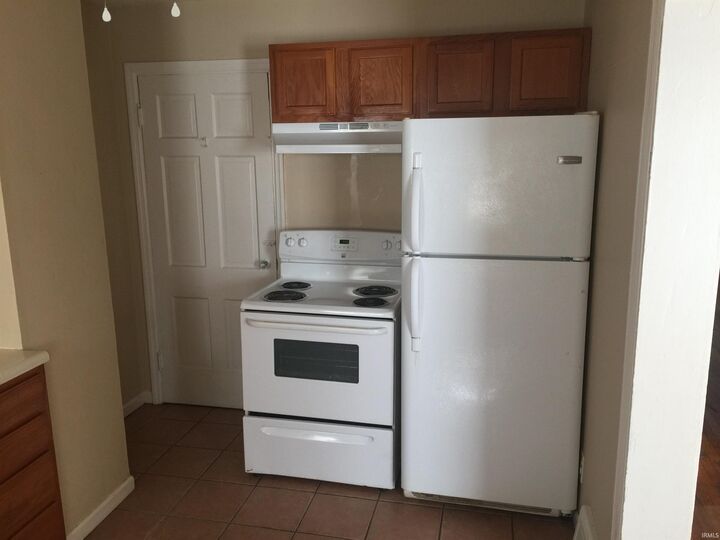 Property Photo:  1217 1219 Corregidor Circle  IN 47714 