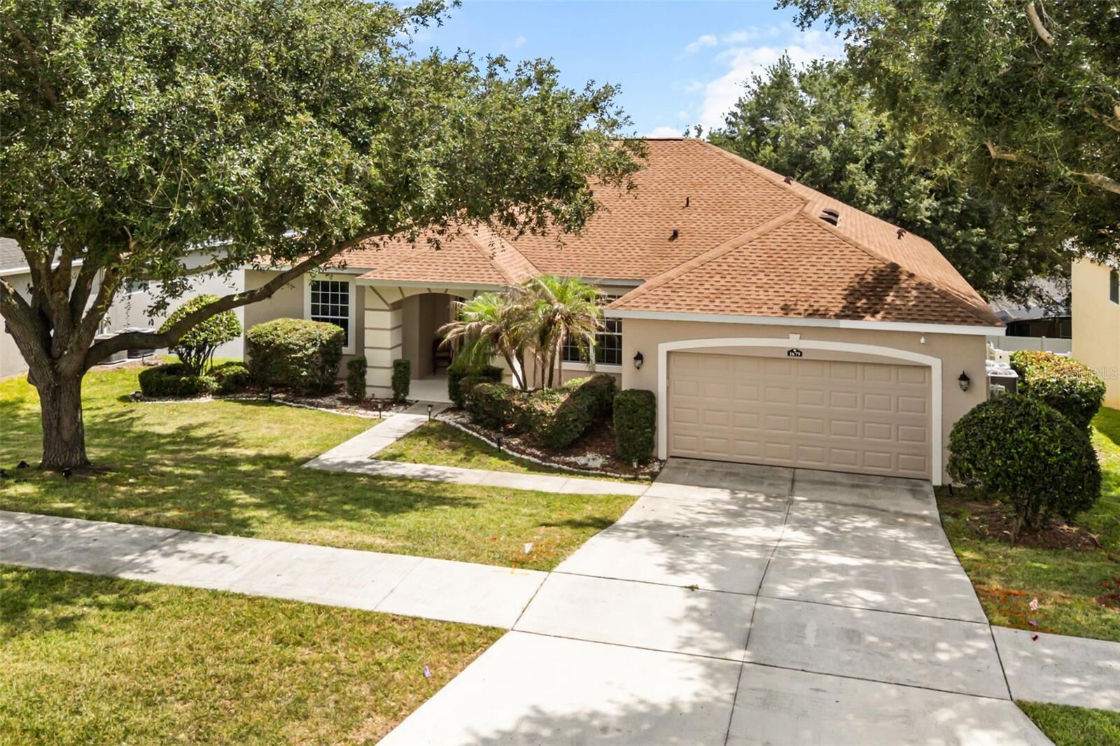 Property Photo: 1679 Grandiflora Avenue FL 34711