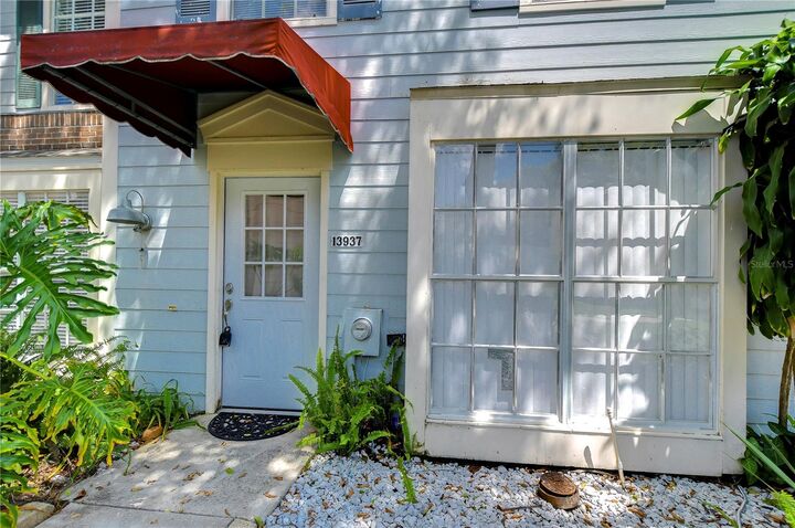 Property Photo:  13937 Fletchers Mill Drive  FL 33613 