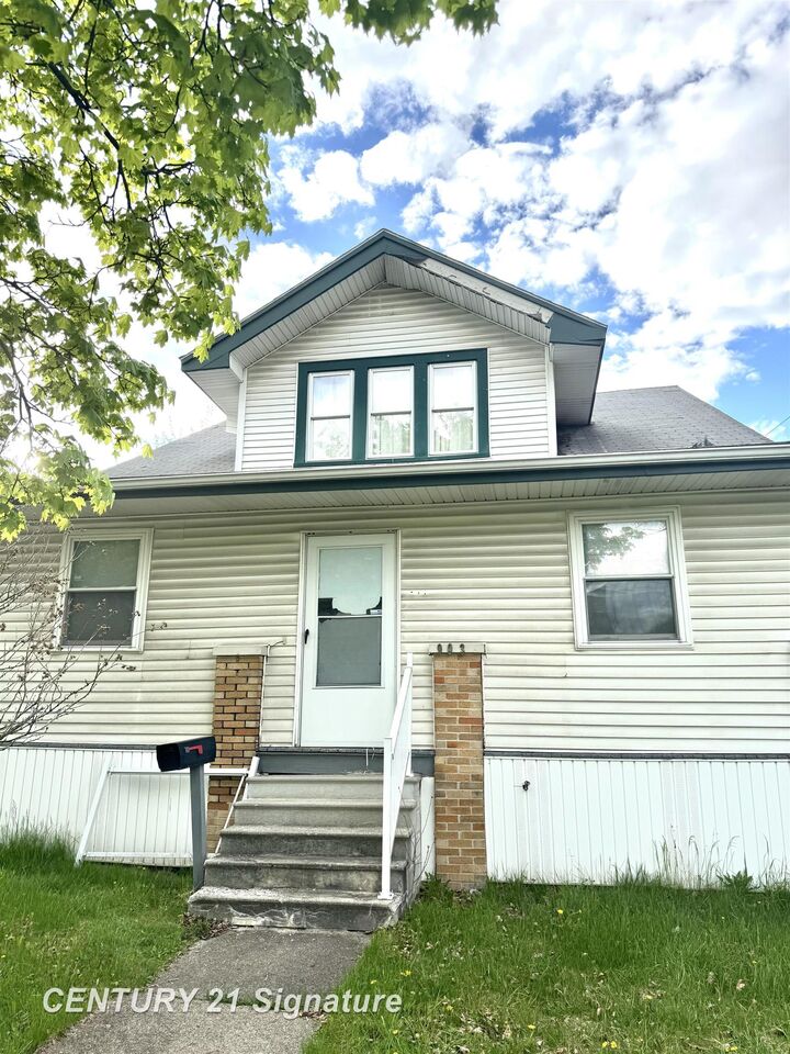Property Photo:  903 S Mason Street  MI 48602 