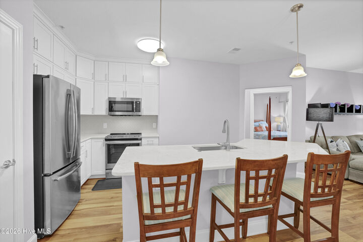 Property Photo:  300 -332 Gateway Condos Drive 332  NC 28445 