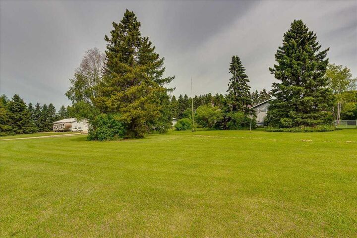 Property Photo: 29104 Highway 27 AB T4H 1P2