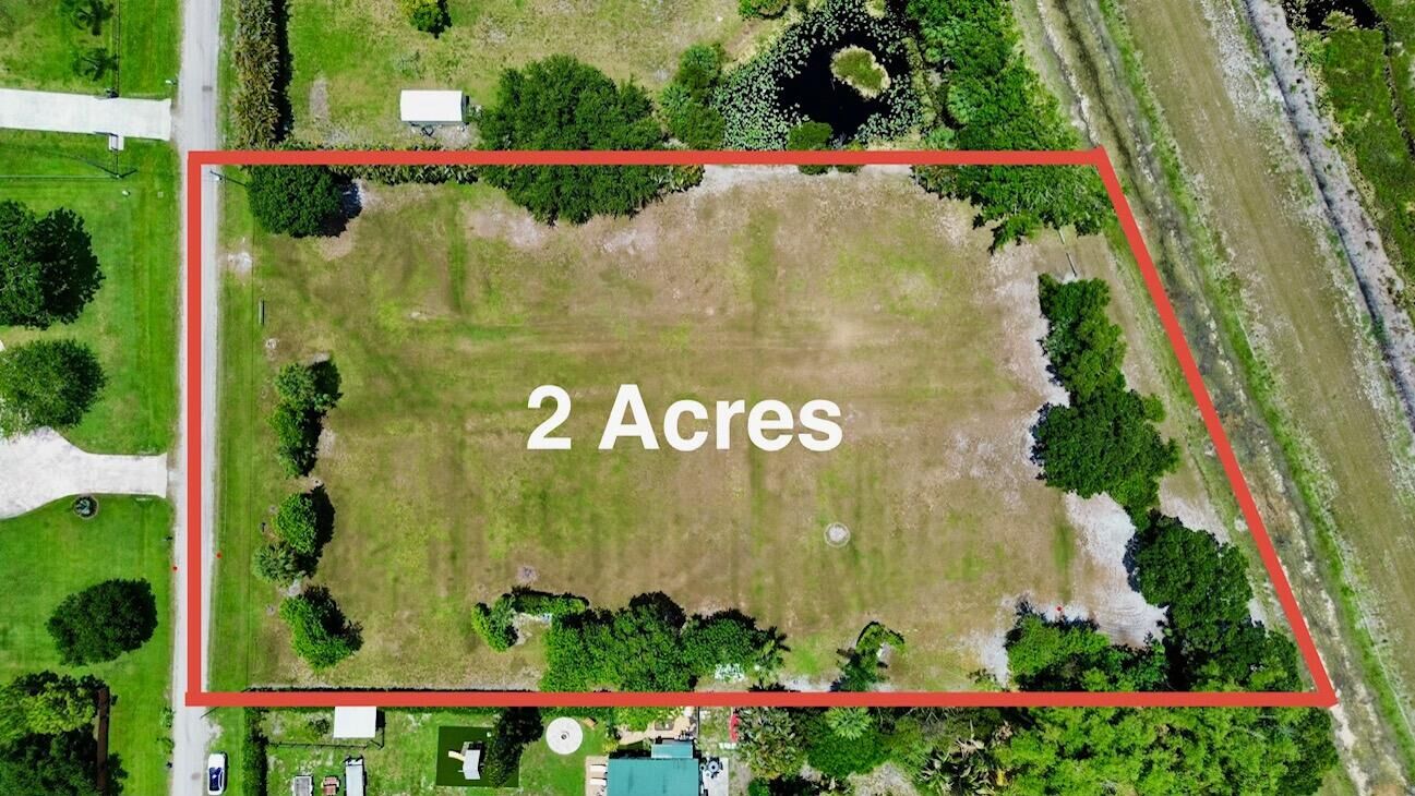 Property Photo: 16546 74th Avenue N FL 33418
