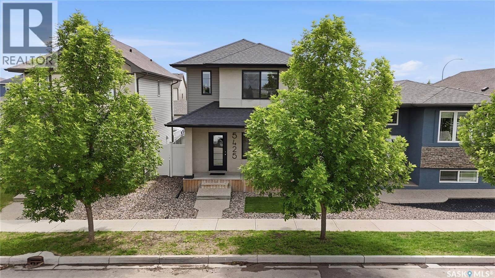 Property Photo:  5425 Campling Avenue  SK S4W 0L6 