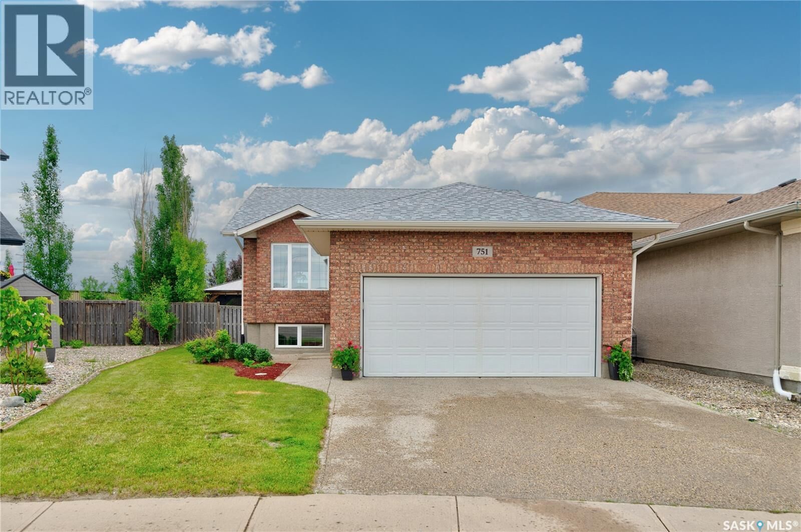 Property Photo: 751 Bluebird Crescent SK S4N 7S3