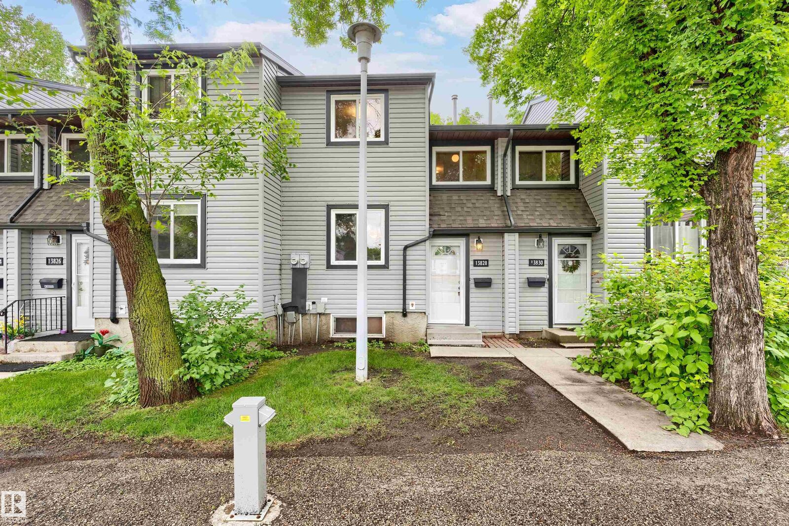 Property Photo:  13828 24 Street NW  AB T5Y 1B6 